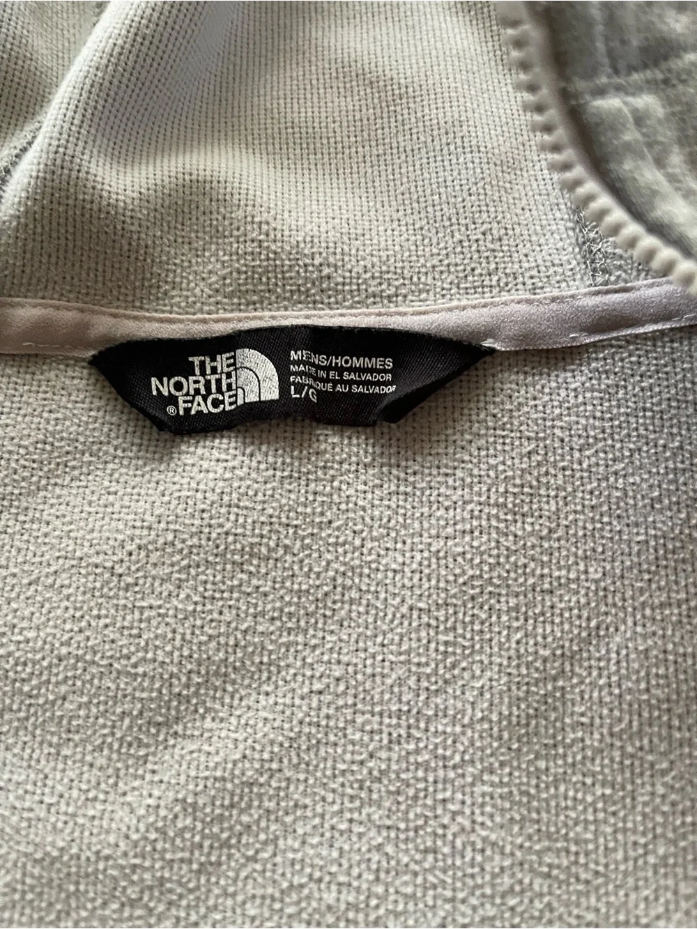 The North Face Men's Hooded Lightweight Jacket in Light Gray with Orange Accents